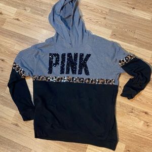Black and grey hooded pink sweatshirt